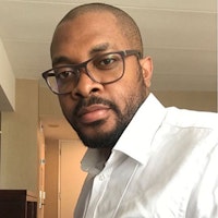 Dr Mike Lakoju