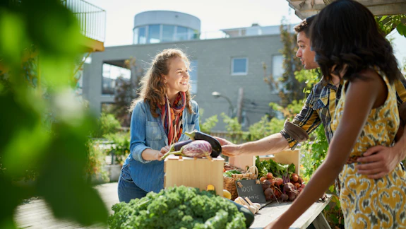 People shopping at farmers market