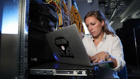 Woman working on laptop at Airbus
