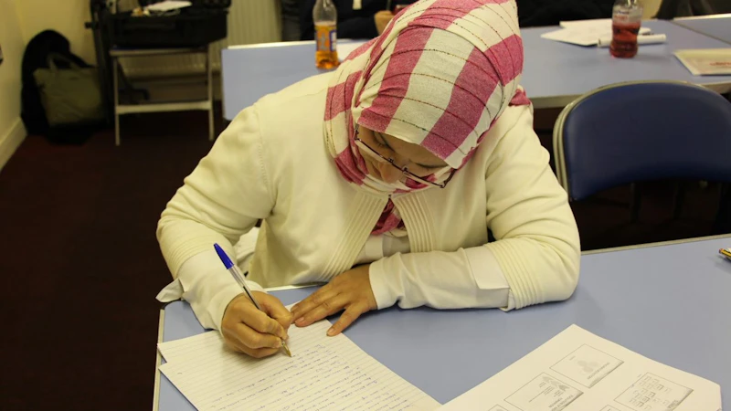 Female student in head scarf studying