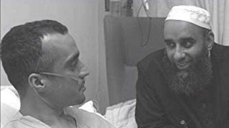 Muslim chaplain visiting a patient