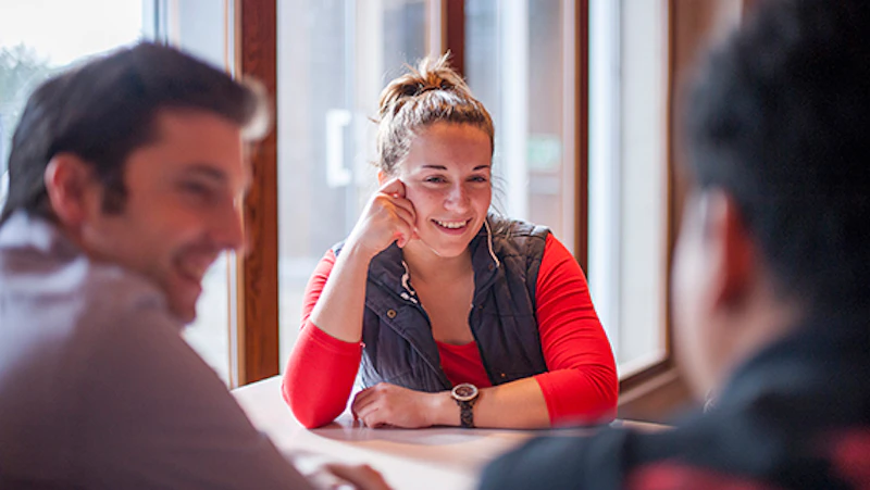 Small group of students talking in students' union