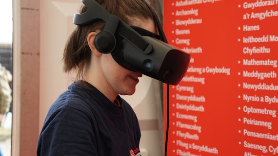 Young person exploring with a VR headset