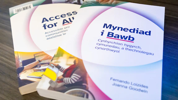 Two books are photographed. They are entitled Access for all and Mynediad i bawb.