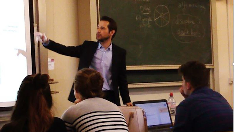 Dr Felix Bethke lectures at Cardiff University