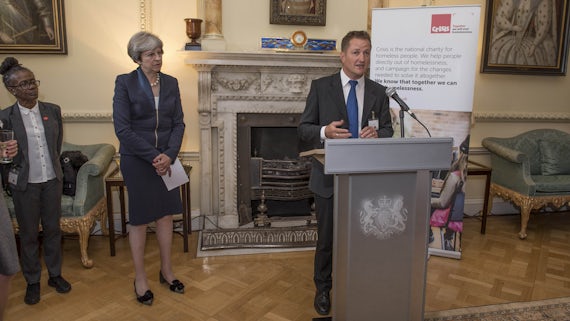 Image of Prime Minister Theresa May hosting a reception with homlessness charity Crisis