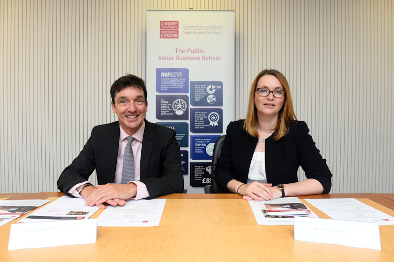 Professor Martin Kitchener sat alongside Kirsty Williams AM