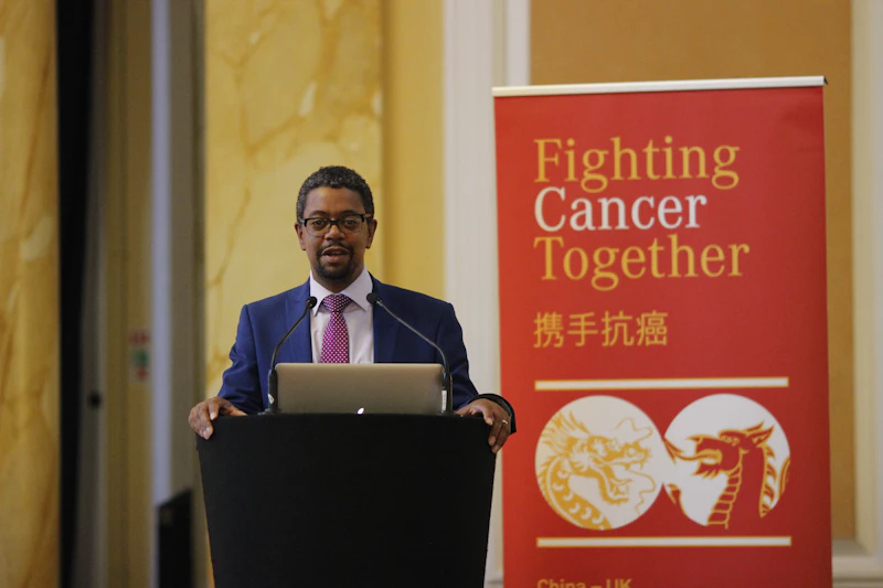 Photograph of Vaughn Gething speaking at the surgical conference