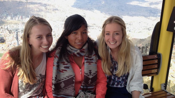 Essay winner Anna (right) with her sister Katie with Doris during their visit to Bolivia.