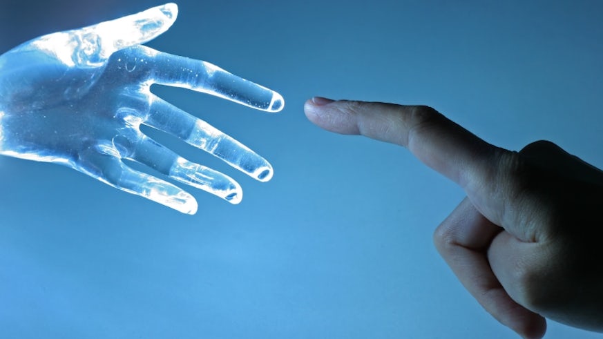 Cyborg hand and human hand