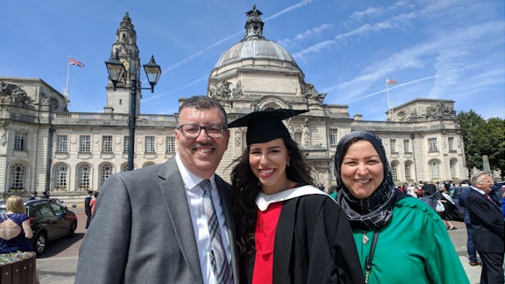 Graduate with her parents