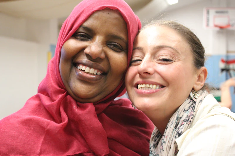 Two women smiling