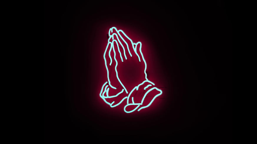 Neon sign of praying hands