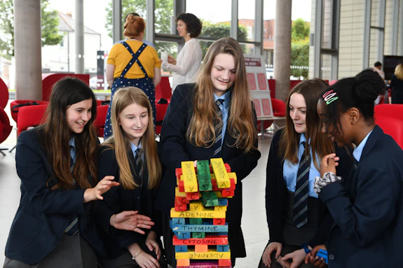 Secondary school children playing 'giant genes'
