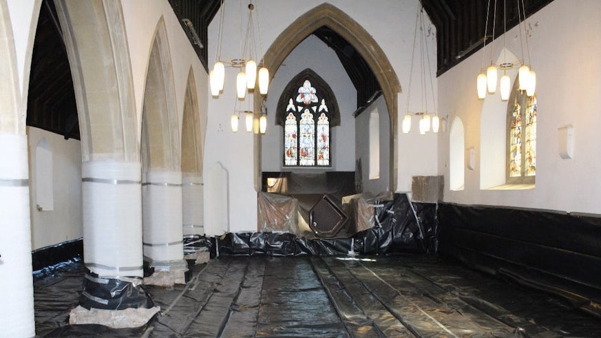 installation of polythene damp proof membrane during retrofit of church