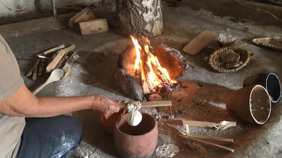 Neolithic cheese making using replica pottery and a naked flame.