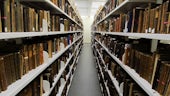 Historical books on shelves in special archives