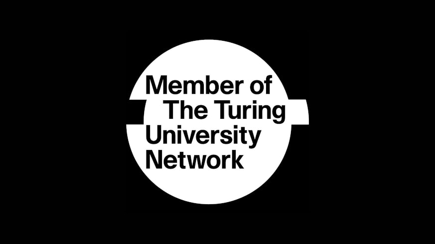 Black and white image of The Turing University Network logo. The text reads: Member of The Turing University Network.