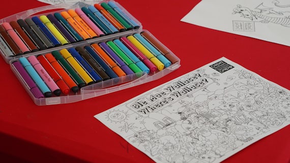 Bilingual colouring activity in the Urdd Eisteddfod