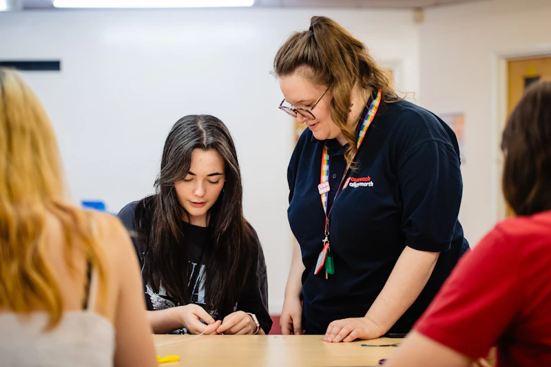 Staff member supporting a participant