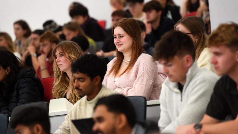 A group of students in a lecture theatre