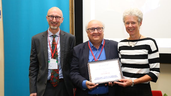 Image of Professor Mike Reed receiving his lifetime achievement award