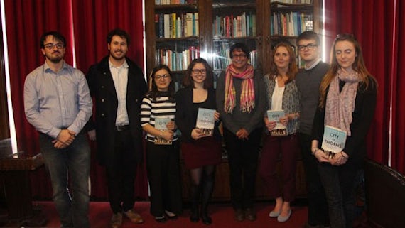 Cardiff Law School’s Global Justice Pro Bon students receive a copy of Ben Rawlence’s book City of Thorns: Nine Lives in the World’s Largest Refugee Camp as a token of thanks for their work. 
