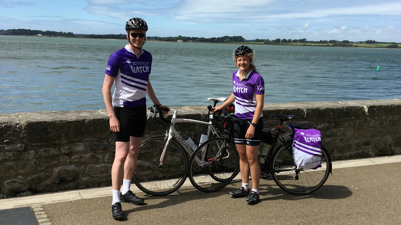 Cyclists by the sea