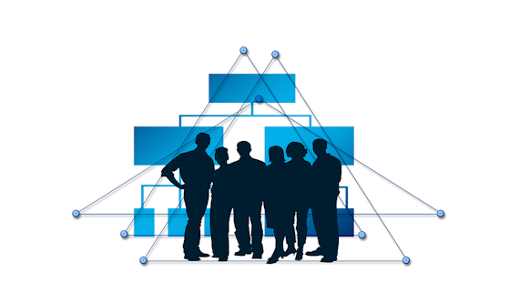 3 men, 3 women in black profile in front of blue triangle style diagrams