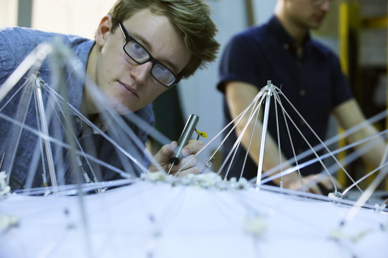 Student studying Engineering model