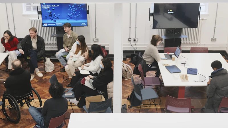 Groups of students taking part in tutorials in the Hybrid Studio.