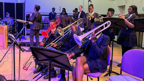 Image of school pupils playing instruments at the School of Music