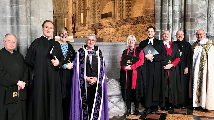 From left to right: Revd Richard Davies (Vicar of Little Newcastle); Norman Doe (School of Law and Politics); Rosie Davies (Assistant Head Teacher, Ysgol Dyffryn Taf); Gerald Davies (Former WRU President); Very Revd Sarah Rowlands (Dean of St Davids Cathedral); Christoper Limbert (Vicar Choral and Cathedral Office Manager, St Davids Cathedral); Arwel Davies (Chapter Clerk, St Davids Cathedral); Stephen Homer (Retired Librarian); Paul Russell (Cambridge University).
