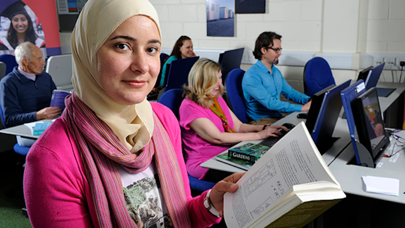 A female student in an IT lab