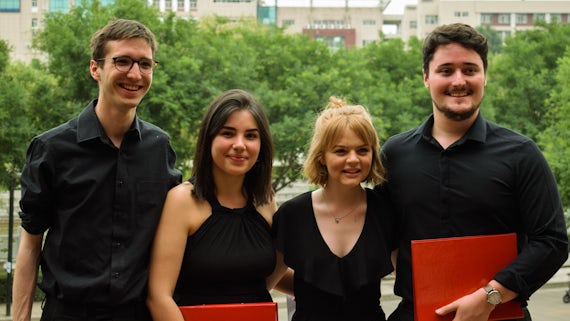 Four students of Cardiff University Chamber Choir