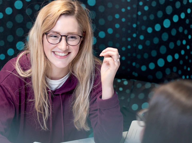 Undergraduate student having a conversation
