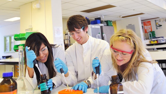 Three students in a lab