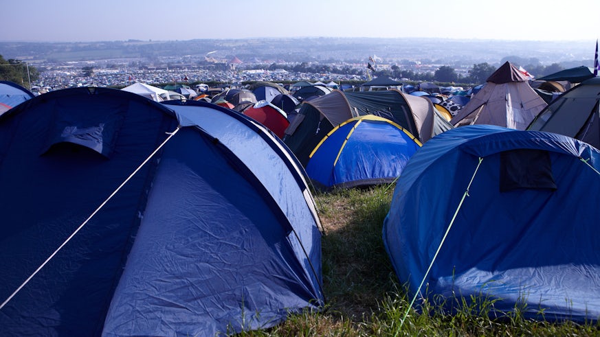 Stock image of tents at a festival