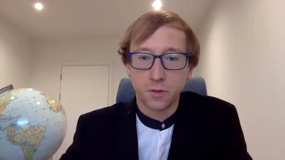 Screenshot of man presenting on Zoom