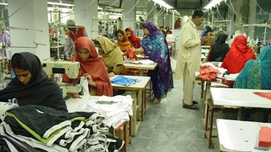 Image of female garment workers at sewing machines