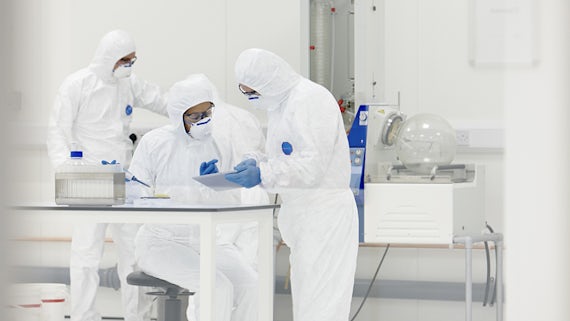 Professionals in a cleanroom environment