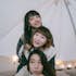 Group of Asian girls in tent