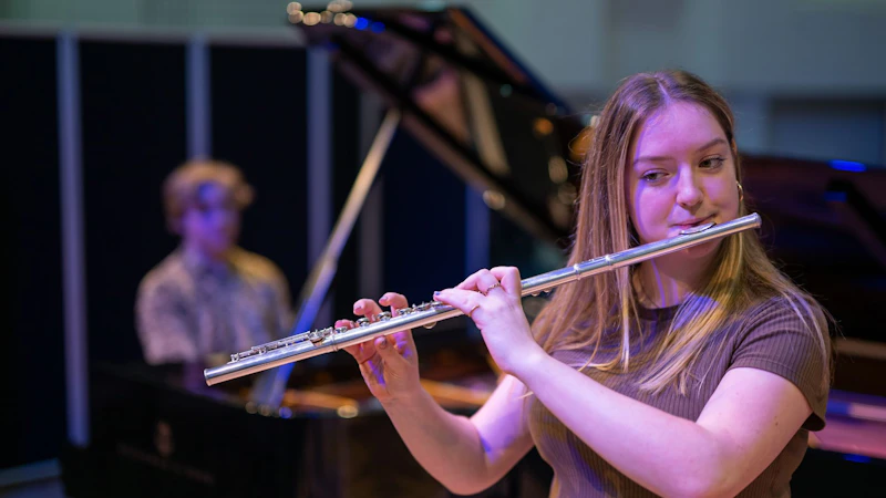 Image of two students performing in the Concert Hall