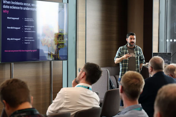 Peter Sueref, Co-founder and Chief Technology Officer at Empirisys, presenting an SME case study in a seminar room.