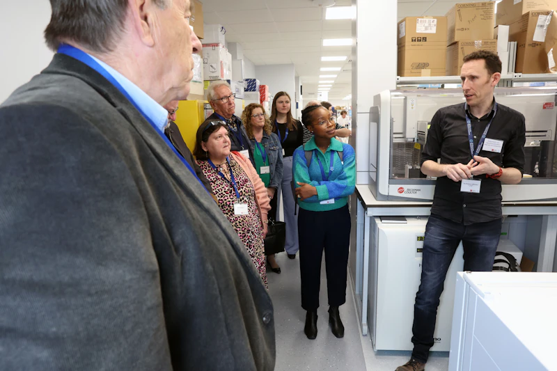 An image of a group of people on a laboratory tour