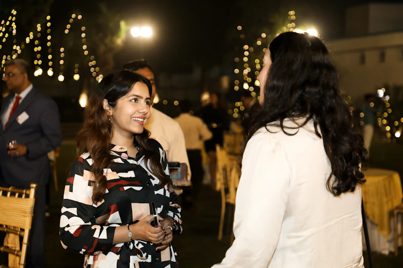 Alumni chatting in New Delhi at the event