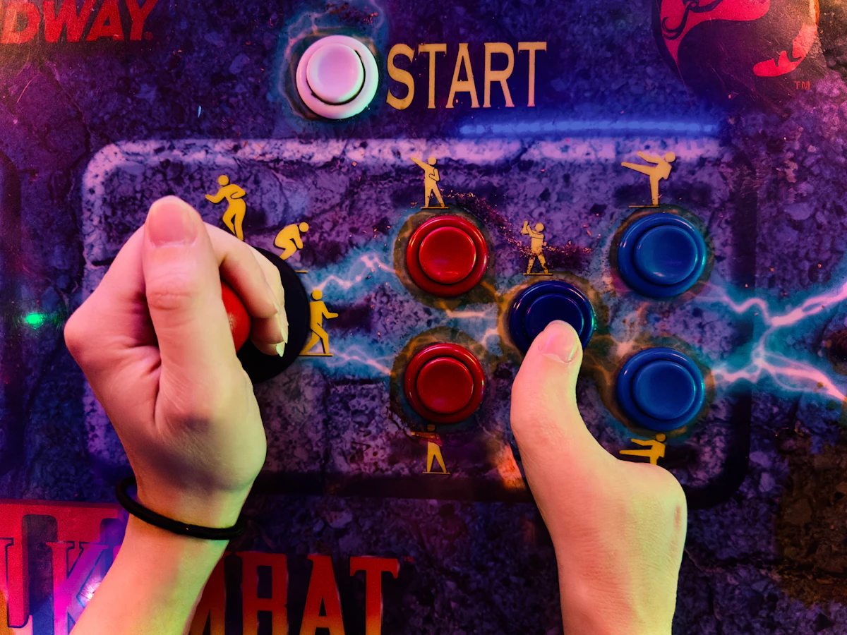 An image of a gamer with a dexterity impairment playing with a gaming controller.