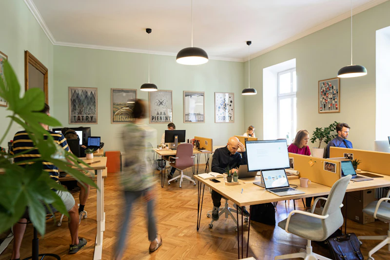 People working in a co-working office space