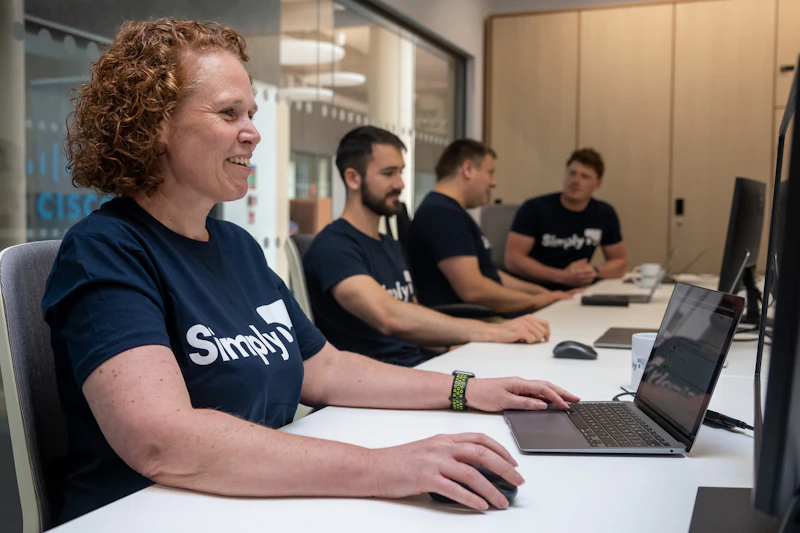 Simply Do team photo in their office