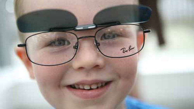 Child wearing glasses. Photo credit: Mike O'Carroll